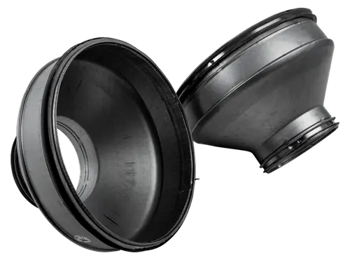 Zwei metallische Reduzierungen, die von Wolf stammen, mit konischem Design und jeweils einer Öffnung zum Anschluss an andere Rohrsysteme.